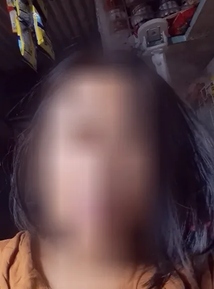 Amina, 32 años